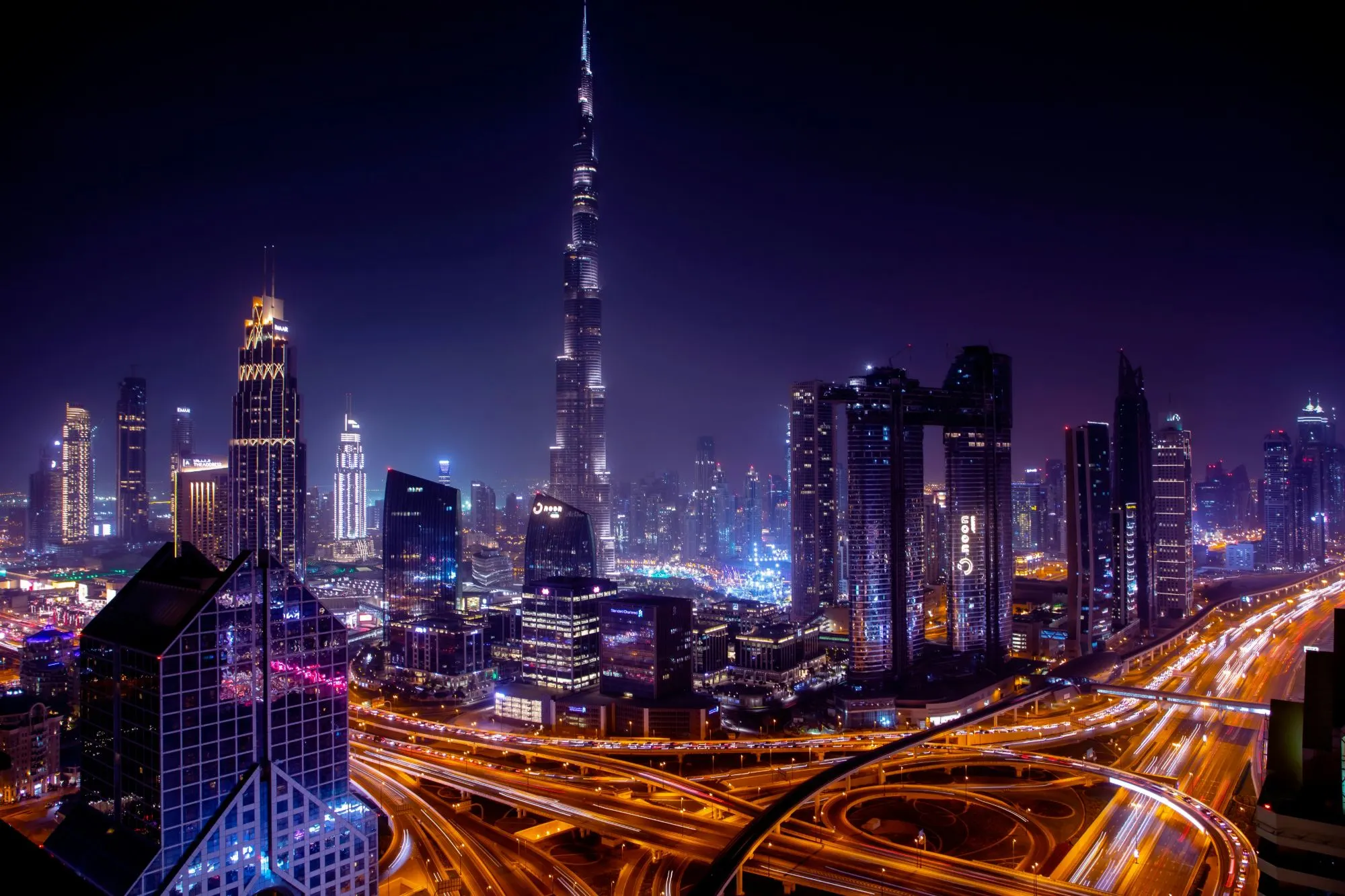 Downtown Dubai at night, with the Burj Khalifa and Sheikh Zayed Road