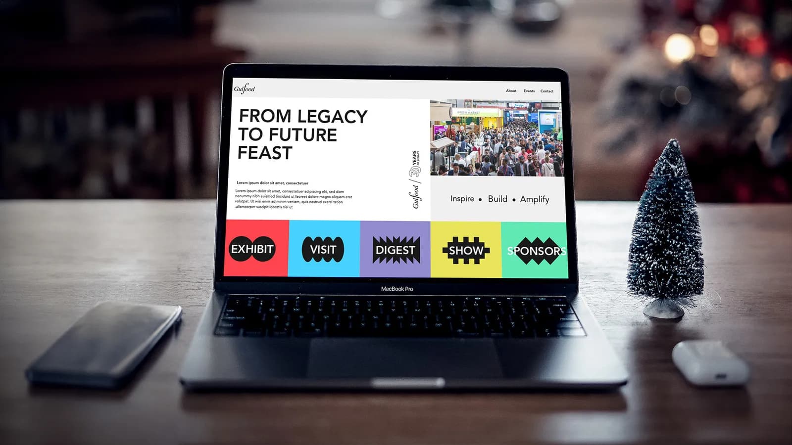 Gulfood campaign visuals on a laptop.